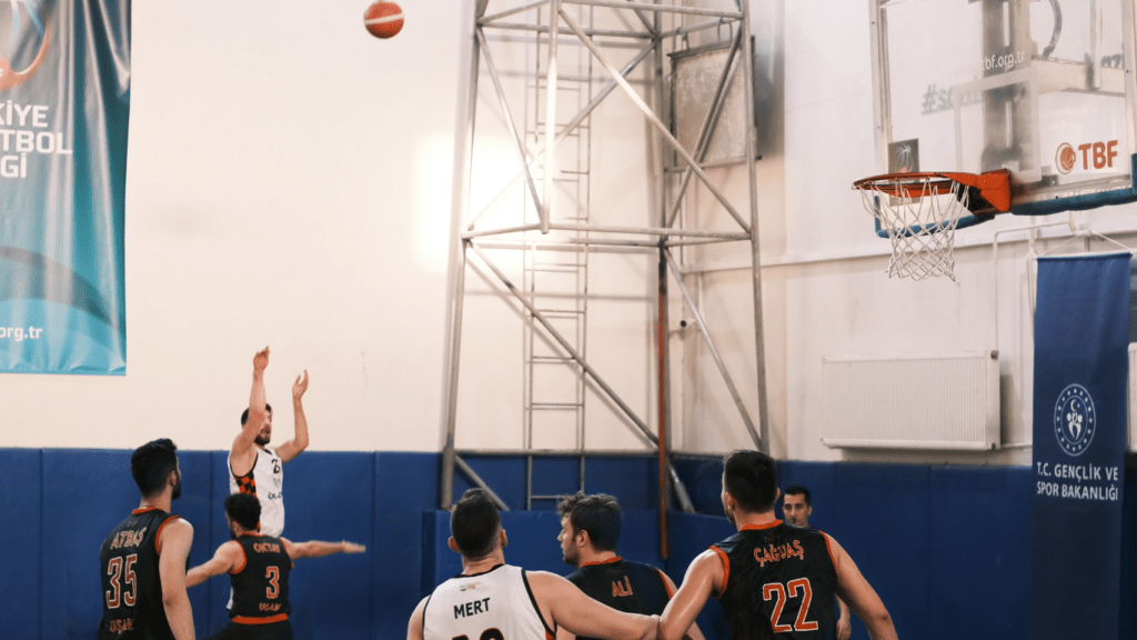 Men Playing Basketball